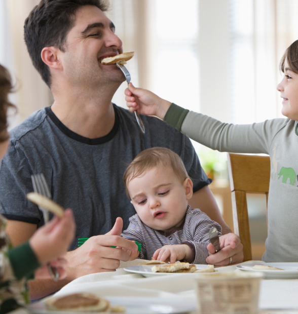 a family eating breakfast